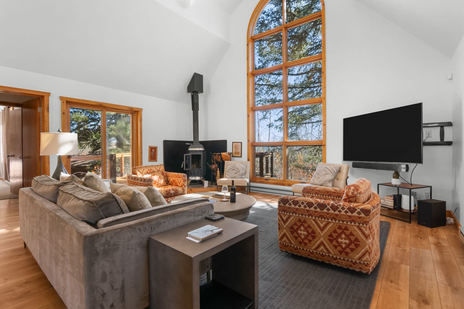 Living Room w/ Wood Stove, View Towards Master & Front Deck