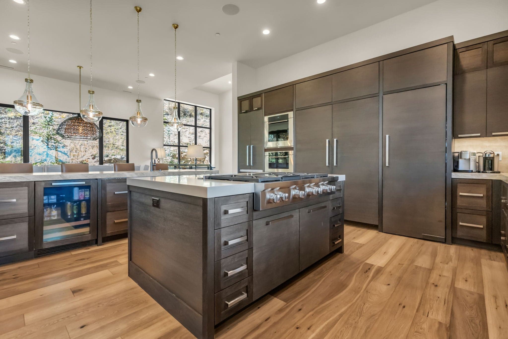 Kitchen Island with Range Cooker, Mini Fridge, Oven, and Pending Lamps