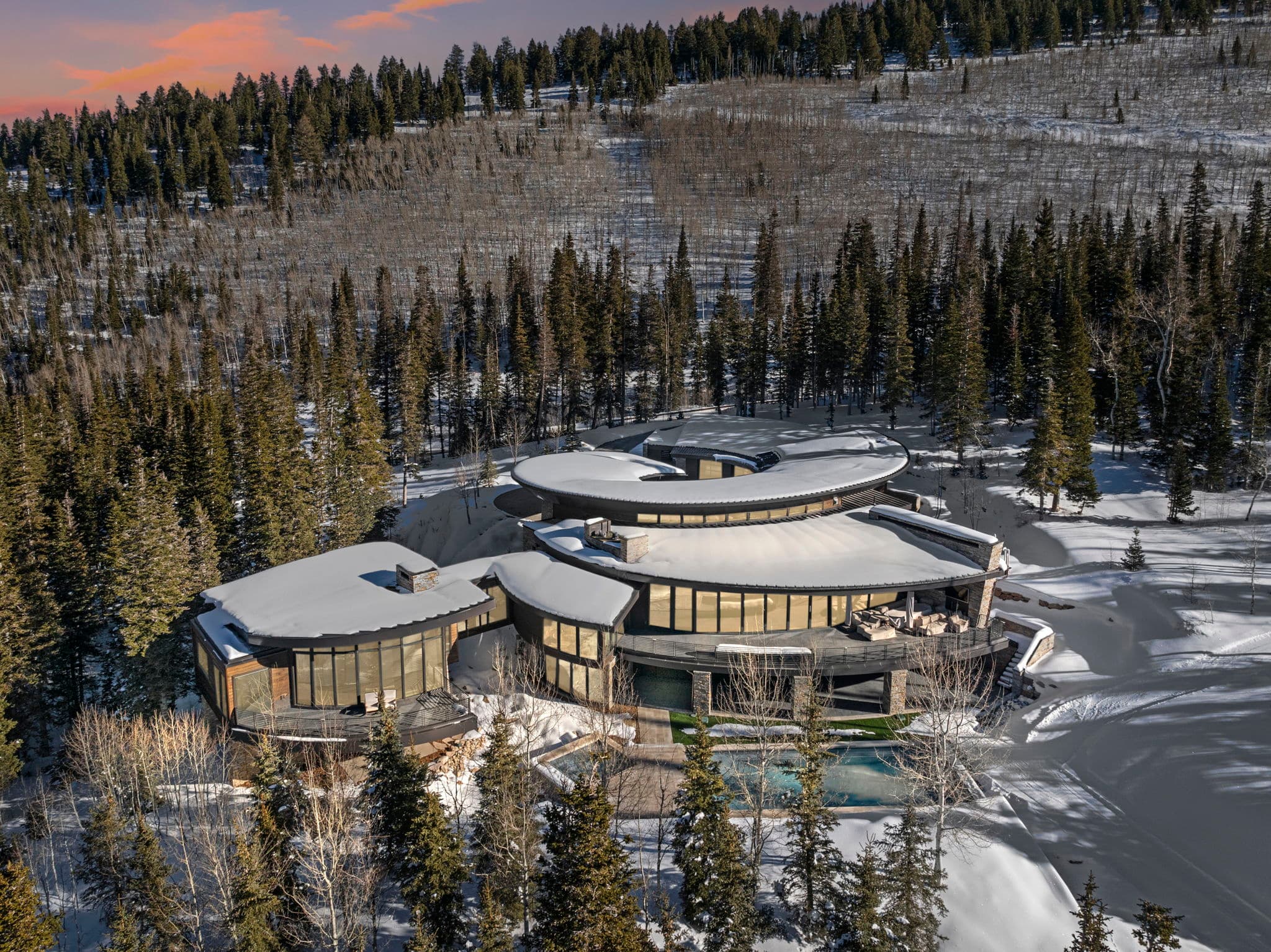 A snowy exterior view of our Alpine Opus at the Colony luxury Park City vacation rental.
