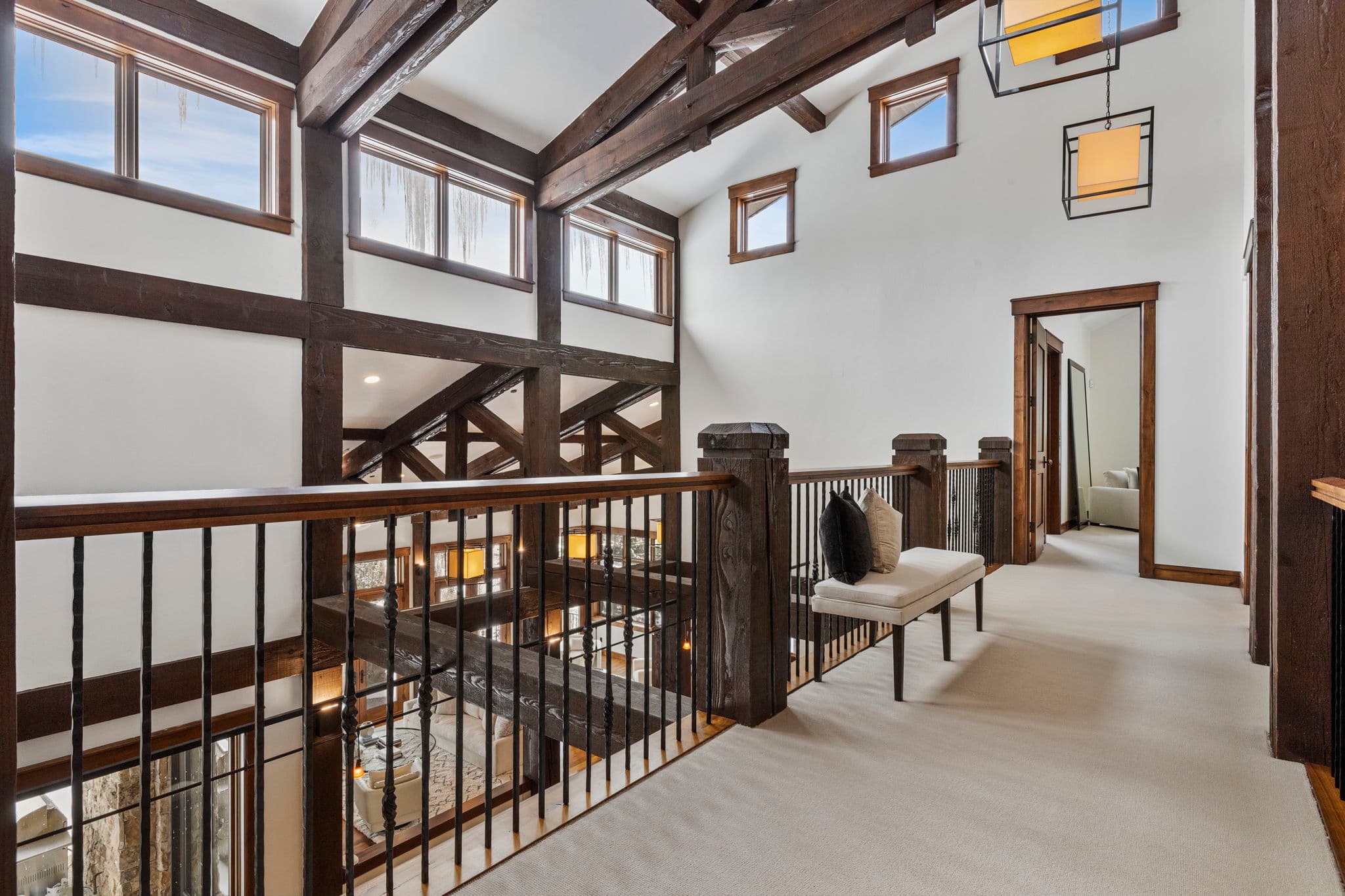 upper breezway with views of the first floor and lots of windows and mountain views