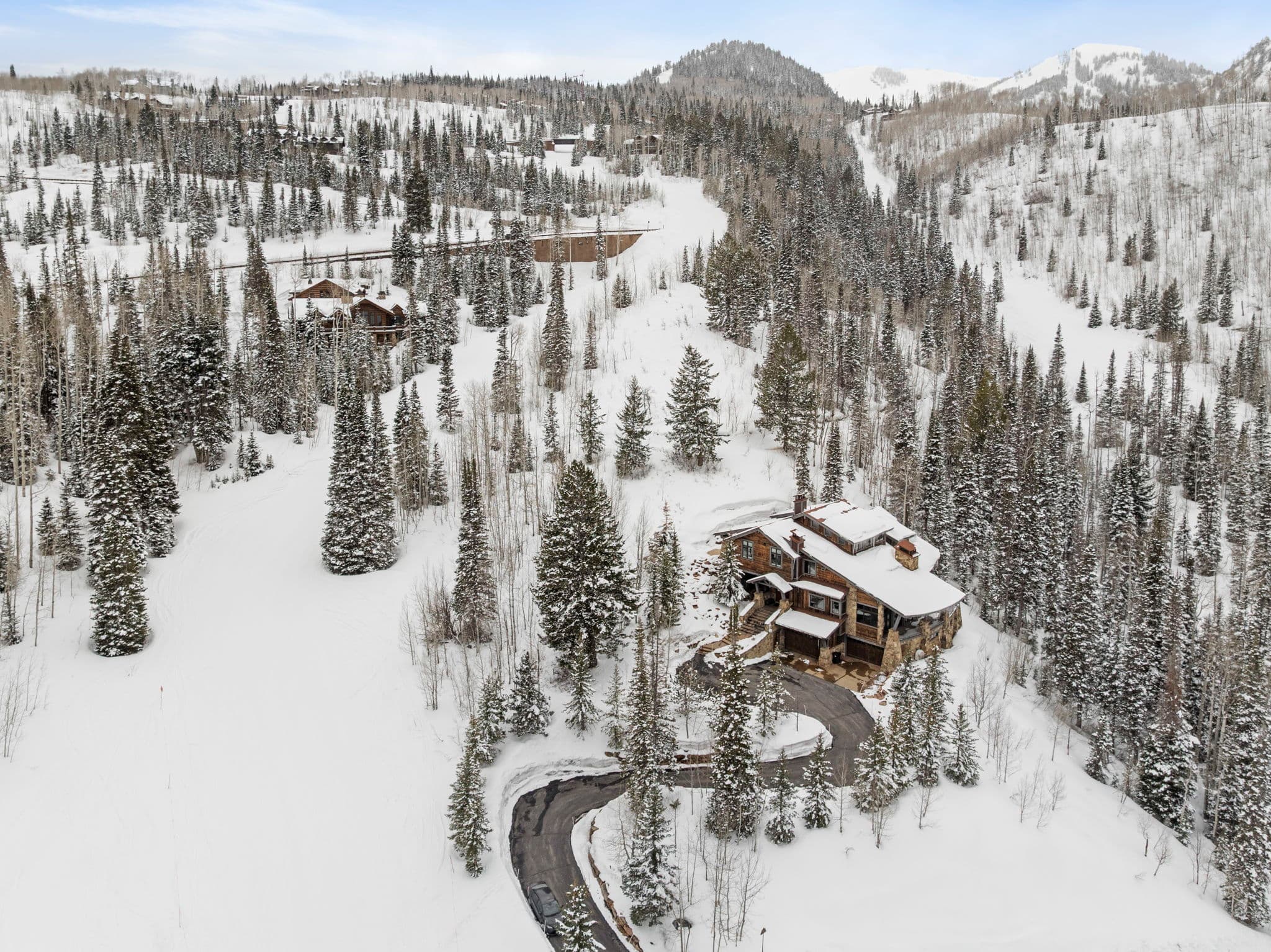 panoramic view of Silver Horse with park city ski runs surrounding the home