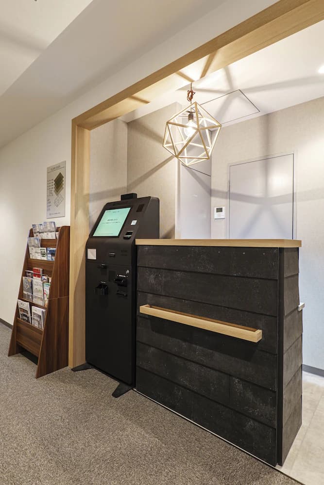 Check-in/check-out kiosk